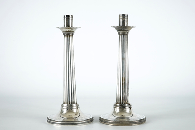 Two silver candle sticks, empire, France, 19th C.