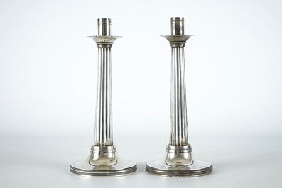 Two silver candle sticks, empire, France, 19th C.