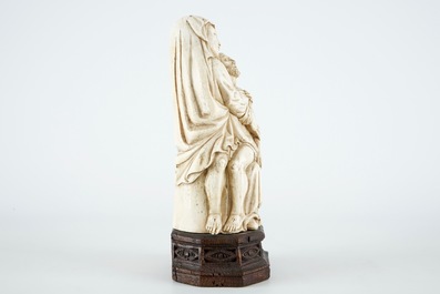 A gothic revival carved ivory Piet&agrave; group, prob. Dieppe, 19th C.