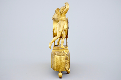Een Empire skeletpendule in brons en emaille met decor van Cupido, Frankrijk, begin 19e eeuw
