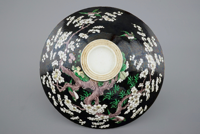 An unusual conical Chinese famille noire bowl, 19th C.