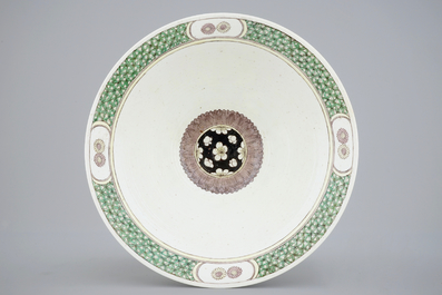 An unusual conical Chinese famille noire bowl, 19th C.