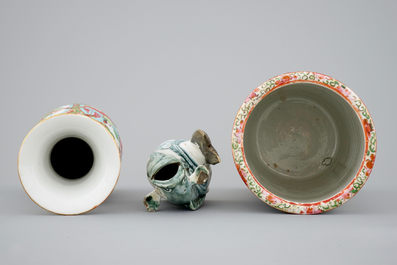 Two Chinese Canton rose medallion vases and a Japanese blue and white Arita model of a fish, 19th C.