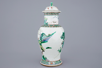 A Chinese famille verte vase and cover with a court scene, 19th C.