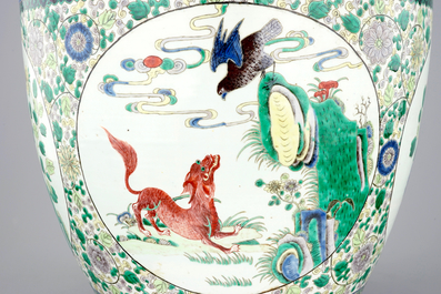 A large Chinese famille verte fish bowl with mythological animals, 19th C.