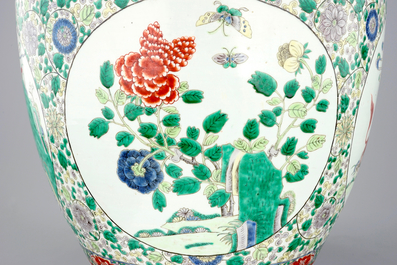 A large Chinese famille verte fish bowl with mythological animals, 19th C.