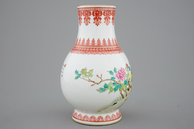 A Chinese Republic famille rose vase with a peacock, 20th C.