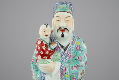 A large Chinese famille rose figure of an immortal, 19/20th C.