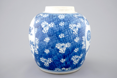 A Chinese blue and white ginger jar with precious objects, Kangxi