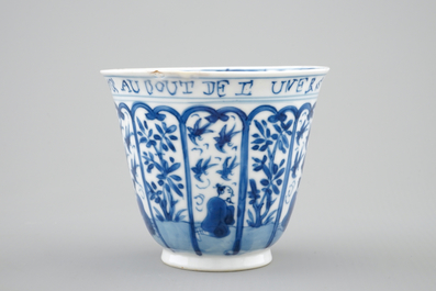 A rare Chinese blue and white Kangxi cup and saucer with French text, Kangxi