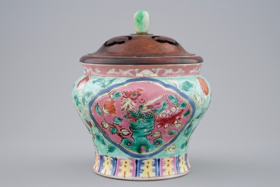 A Chinese turquoise ground &quot;Straits&quot; jar and jade-finial cover for the Indonesian market, 19th C.