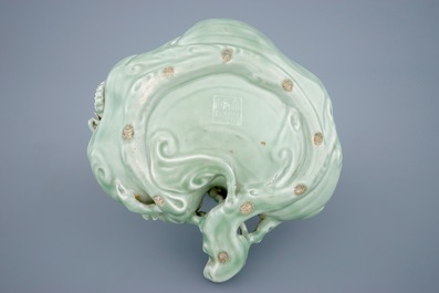 A Chinese monochrome celadon glazed brushwasher formed as a lingzhi fungus, 19th C.