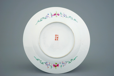 Two Chinese bowls with floral designs and a millefleur plate, 19th C.