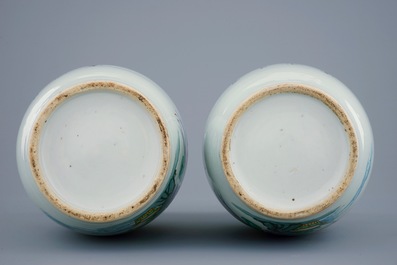 A pair of Chinese famille rose vases with ladies in a garden, 19/20th C.