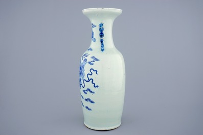 A Chinese blue and white on celadon ground porcelain vase with foo dogs, 19th C.