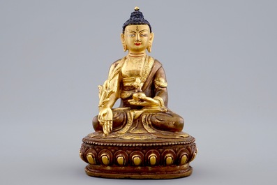 A Sino-Tibetan gilt bronze figure of a seated Buddha, 19/20th C.