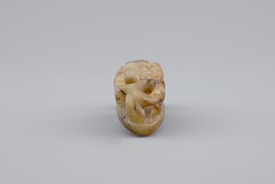 A Chinese mottled jade belt hook, 20th C.