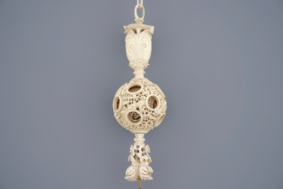 A hanging Chinese ivory puzzle ball, Canton, 19th C.