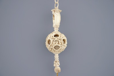 A hanging Chinese ivory puzzle ball, Canton, 19th C.