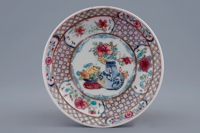 A Chinese famille rose ruby back eggshell cup and saucer, Yongzheng, 1723-1735