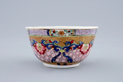 A Chinese famille rose eggshell cup and saucer with a cat, Yongzheng, 1723-1735