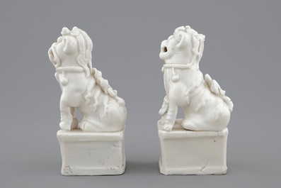 A pair of Chinese Dehua blanc de Chine buddhist lion joss stick holders, 18/19th C.