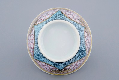 A Chinese famille eggshell rose cup and saucer with a central flowervase, Yongzheng, 1723-1735