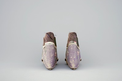 A pair of Chinese embroidered lotus shoes, 19/20th C.