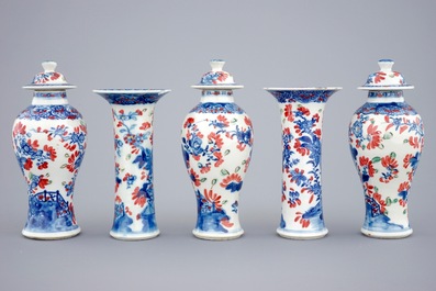 A small Chinese partly clobbered blue and white five piece garniture, Qianlong, 18th C.