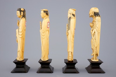 A set of 8 fine Chinese carved ivory immortals on wooden bases, 19th C.