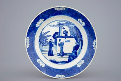 A Chinese blue and white vase with ruyi handles and a Kangxi-style plate, 19th C.