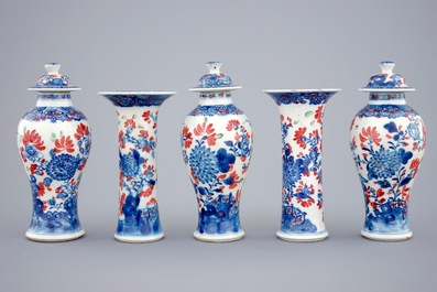 A small Chinese partly clobbered blue and white five piece garniture, Qianlong, 18th C.