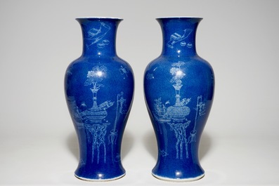 A pair of Chinese powder blue ground vases with incised decoration, 19th C.