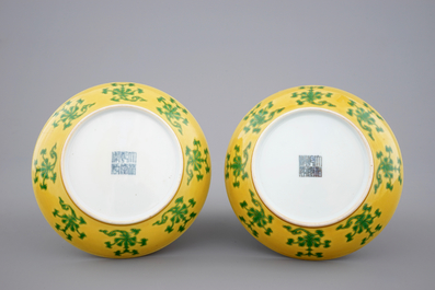 A pair of Chinese yellow glazed saucer dishes with incised backs, Qianlong sealmark and poss. of the period