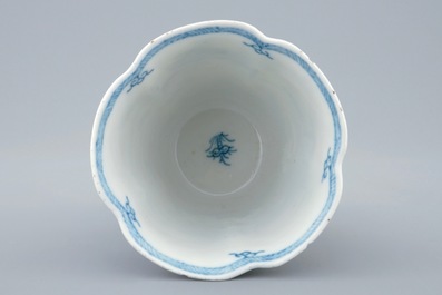 A Chinese blue and white faceted cup on foot, Kangxi