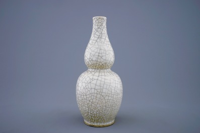 A Chinese monochrome crackle glazed double gourd vase, 19th C.