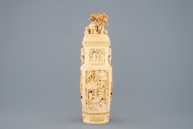 A very fine Chinese carved ivory vase and cover with figures in a landscape, ca. 1900