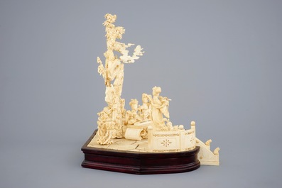 A large Chinese carved ivory group of musicians on a wooden base, early 20th C.