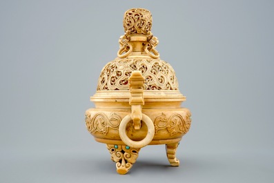 A Chinese inlaid and carved ivory tripod censer on wooden base, 19th C.