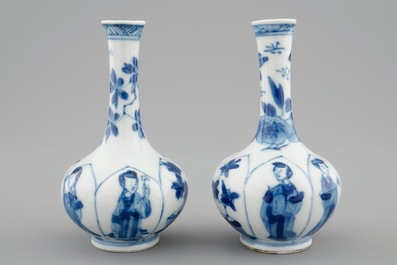 A pair of Chinese blue and white bottle shaped vases with long Elizas, Kangxi