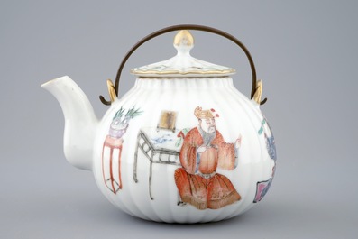 A Chinese famille rose teapot and cover, 19th C.