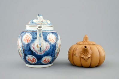 A Chinese famille rose teapot, 18th C. and a Yixing teapot, 19/20th C.