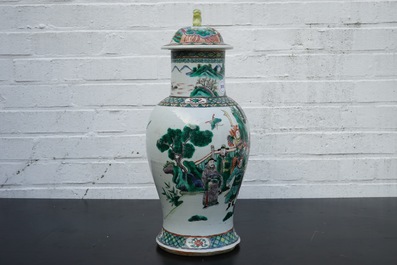 A Chinese famille verte vase and cover with a court scene, 19th C.