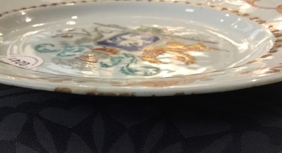 A Chinese Duch-market armorial plate inscribed &quot;De Van Heemskerkens&quot;, Qianlong, 18th C.