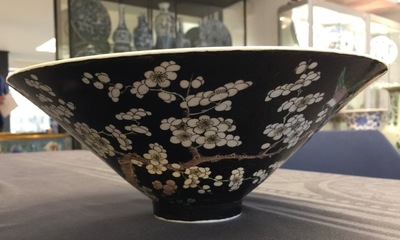 An unusual conical Chinese famille noire bowl, 19th C.