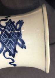 Een Chinese balustervaas met draken in blauw, wit en onderglazuur rood, Kangxi