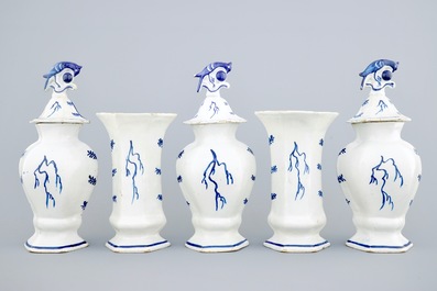 A blue and white Dutch Delft five-piece garniture with peacock's tails, 18th C.