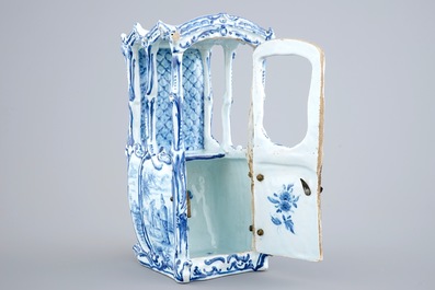 A blue and white model of a sedan chair in Dutch Delft style, France, 19th C.