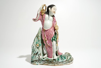 A Chinese famille rose figure of Liu Hai with the toad, 20th C.