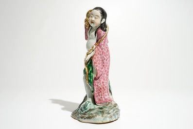 A Chinese famille rose figure of Liu Hai with the toad, 20th C.